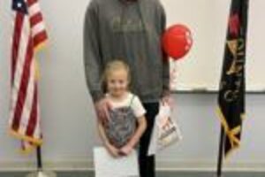 Girl who called 911 for her father honored